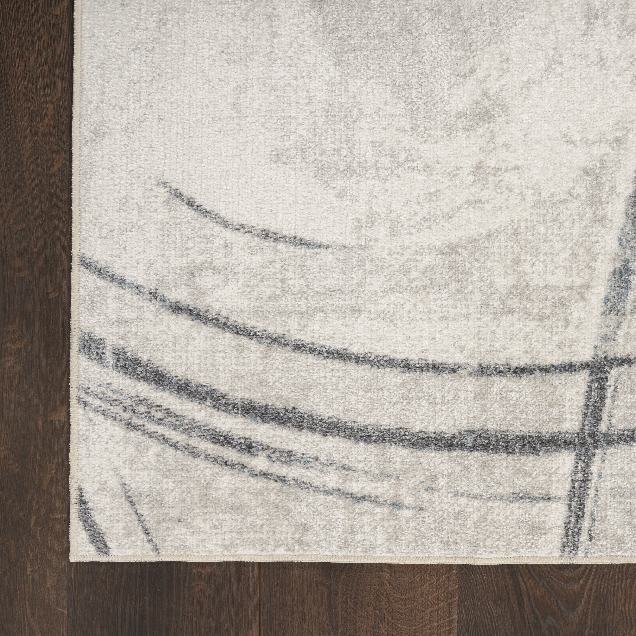 Astra Machine Washable 6'7" X 9' Silver Blue Modern Indoor Rug
