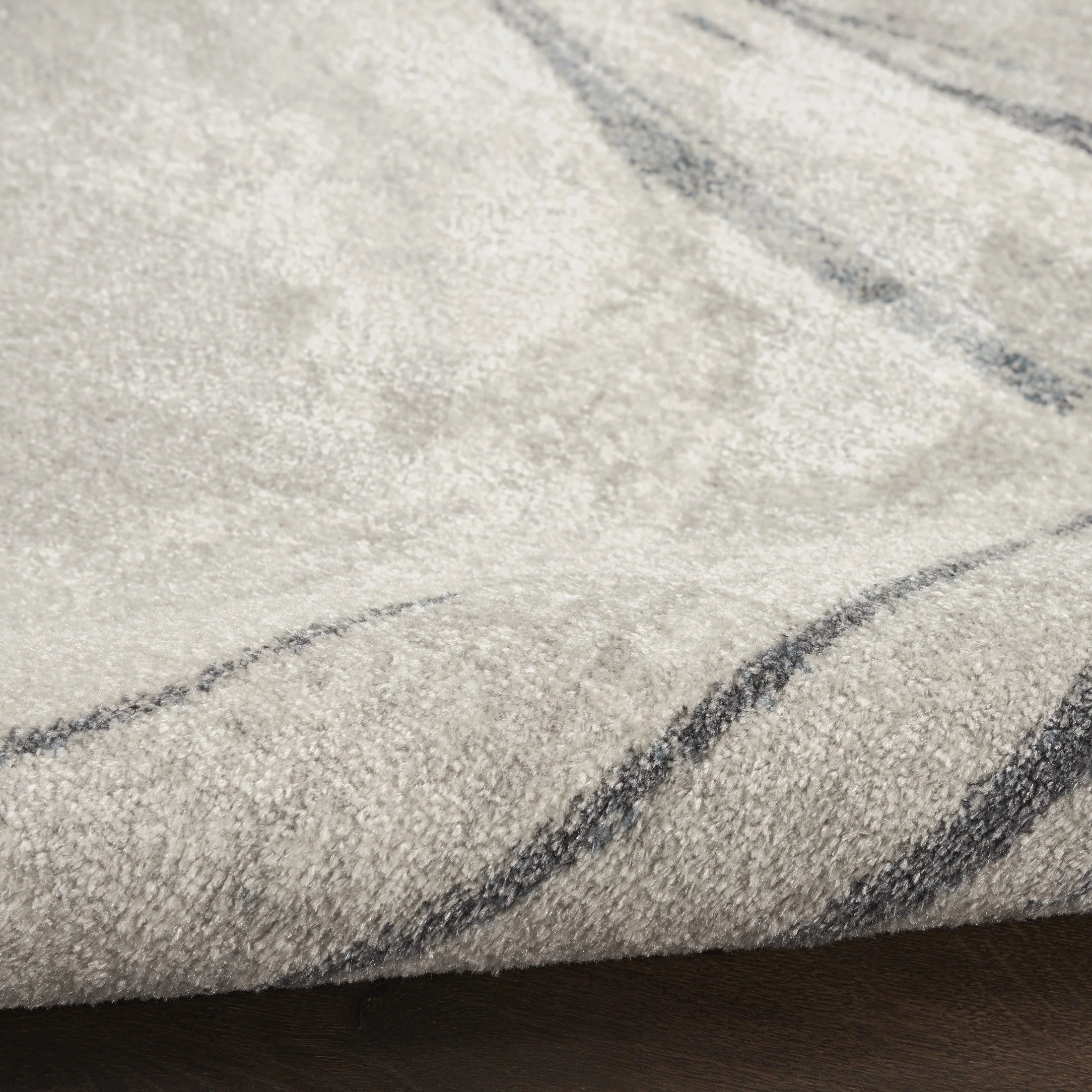 Astra Machine Washable 6'7" X 9' Silver Blue Modern Indoor Rug